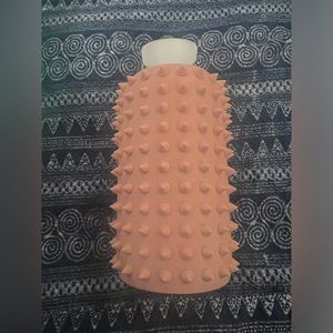 Bkr 32 ounce spiked bottle. Unknown color name, light terra cotta orange